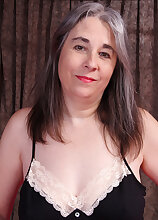 Busty Mature Olivia Olay Spreads Her Legs And Masturbates For Us