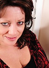 Thick mature wife Cheryll Stone licks her big tits.