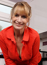 Mature babe Jane B rocking in red