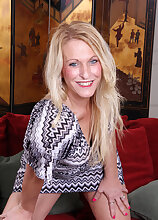 Blonde sexpot Jackie takes off her dress and heels to fuck herself with a toy