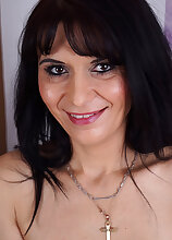 Latina hottie Gracia Saluda does some laundry and teases with her slim form