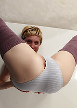 After a long workout 30 year old Katrina Mathews likes to stretch