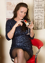 Beautiful brunette Marlyn from AllOver30 slips out of her elegant dress