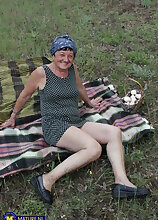 73 year old grandma Hanna D. seduced a younger stranger to fuck her in an open field