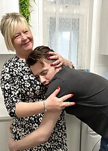 Curvy British GILF Chantelle is fucking and sucking a cheating young guy on the sofa