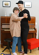 Mature.nl - Sharon Amore is a horny grandma who gets fucked by her toyboy student at home