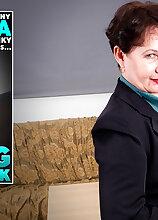Mature.nl - Granny Nata is wearing a buttplug at the office